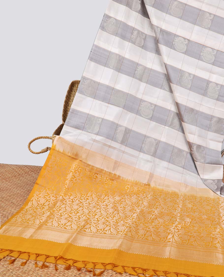 Borderless multi-color checked,peacock buttas soft silk saree with floral vine zari design pallu