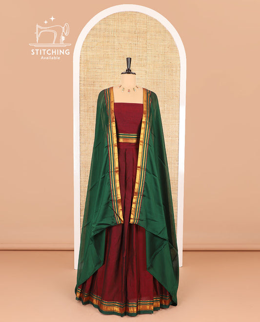 Maroon half-saree, plain with contrast traditional zari border skirt, matching zari bordered blouse, and contrast plain zari border dhavani