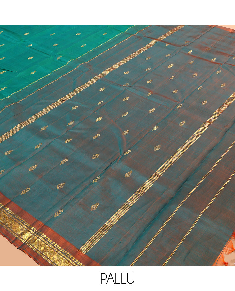 Green Kanchipuram Silk Saree, Woven with Zari Buttas, a Contrast One-Sided Border of Panner Sombu, Banaras, and Jaal Designs, Zari Design Pallu, and No Blouse