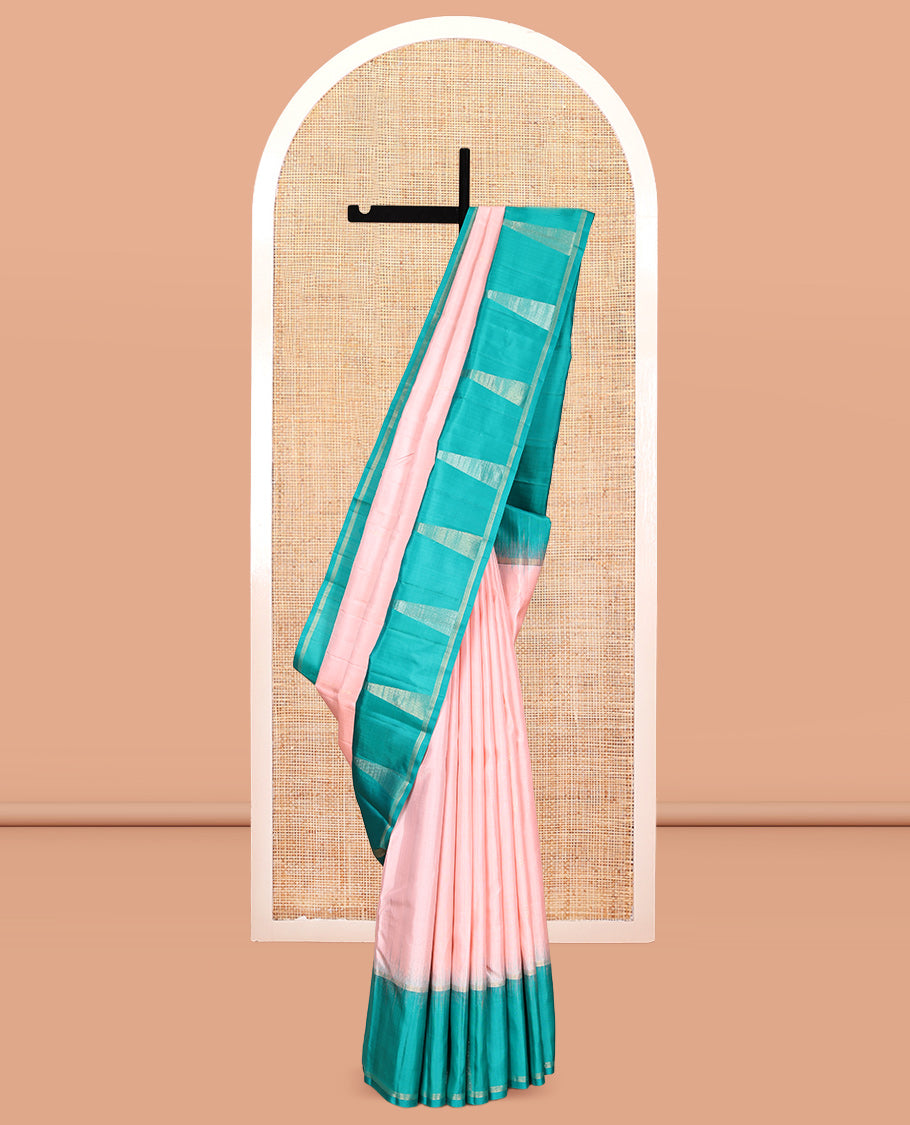 Peach Kanchipuram Silk Saree, Sparsely Woven with Buttas, Complemented by a Contrast Thazampoo Rekku Border, Chevron Striped Pallu, and a Contrast Blouse