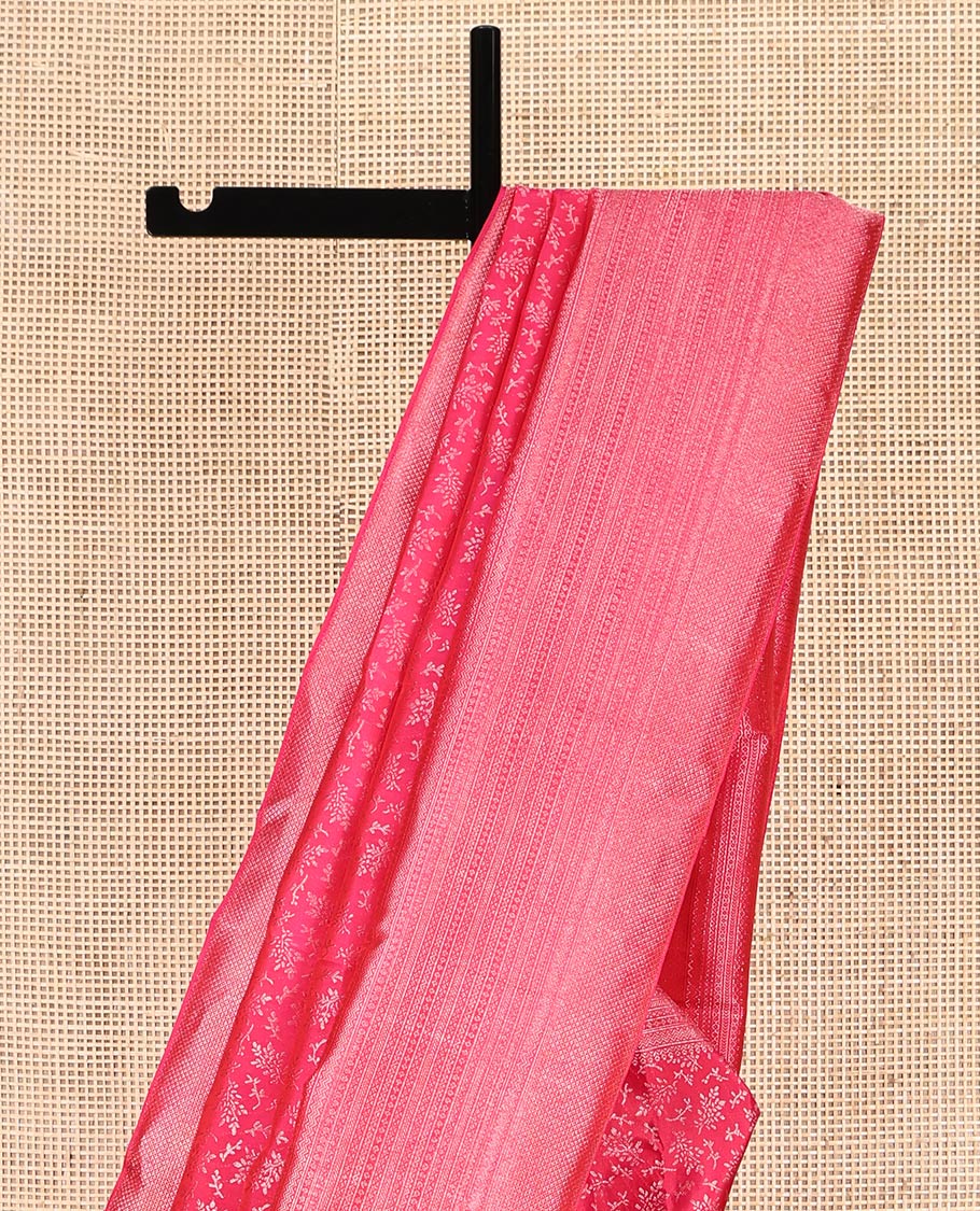 Pink Kanchipuram Wedding Silk Saree, Ornamented with Floral Jacquard, a Zari Geometric Pattern Border, Diagonally Striped Pallu, and a Matching Blouse