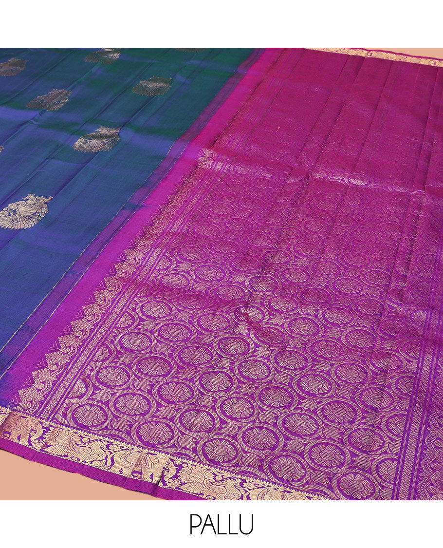 Blue Kanchipuram Silk Saree, Enthralled with Iruthalai Pakshi Buttas All Over Its Body, Complemented by Contrast Border of Rekku, Mayil, and Yaanai Designs, Pallu of Floral Jaal Designs, and Paired with a Contrast Blouse
