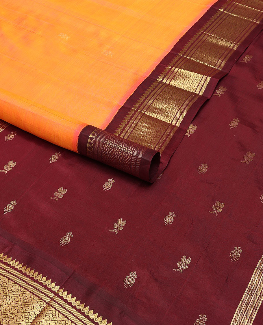 Orange buttas kancheepuram silk saree with contrast korvai border of banaras, thilakam mokku design & zari design border