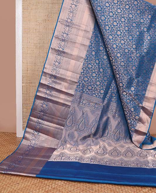 Blue floral jacquard kancheepuram silk saree with self border of thilakam mokku, banaras, poo chakram, manga, kodi visiry design & zari design pallu
