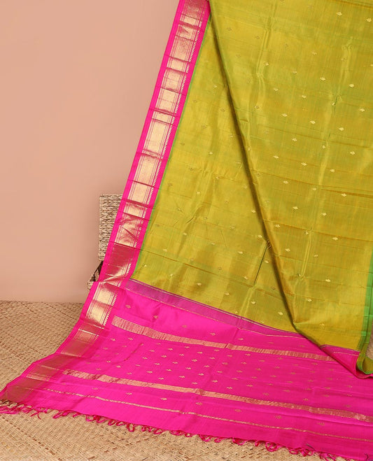 Green leaf buttas kancheepuram silk saree with contrast border of thilakam mooku, banaras, muthu, jaal design & zari design pallu