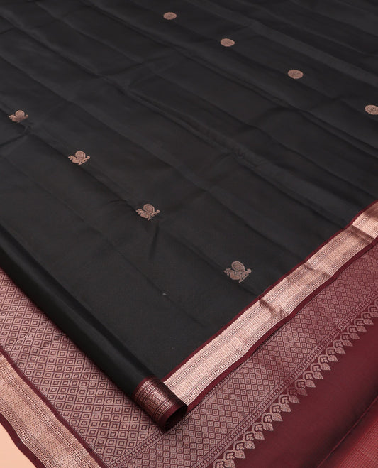Black Vasundhara Lite Silk Mix Saree, Mesmerized with Mayil Buttas, a Contrast Border of Thilakam Mokku, Muthu, Lavangam, and Neli Designs, Jaal Pallu, and a Contrast Blouse