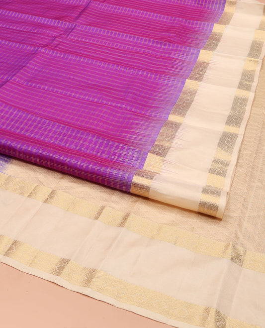 Purple Vasundhara Silk Saree, Steeped in Richness of Micro-Zari Checks All Over Its Body, Complemented by Contrast Rettai Pettu Border of Thilakam Mokku, Diamond, and Cross Kamalam Designs, Grand Jaal Pallu, and Paired with a Contrast Blouse