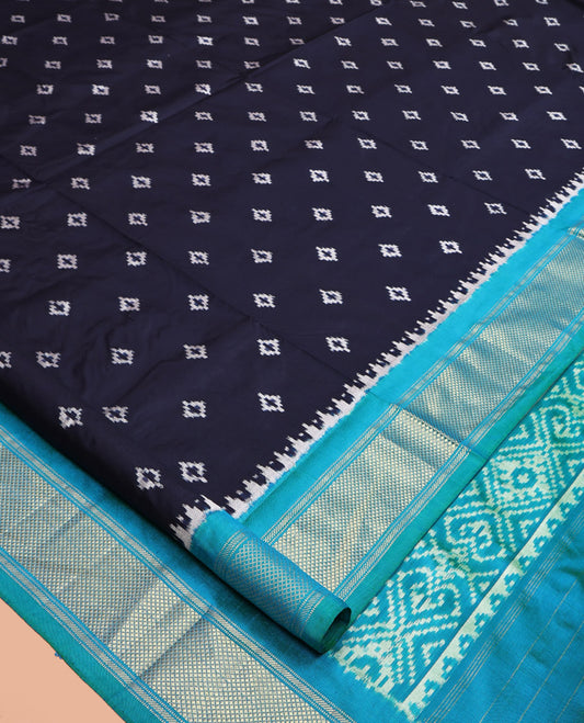 Blue Pochampally Ikat Silk Saree, Accentuated with Ikkat Buttas on Its Body, Complemented by Contrast Temple Traditional Design Border, Pallu of Intricate Patterns, and Paired with a Contrast Blouse