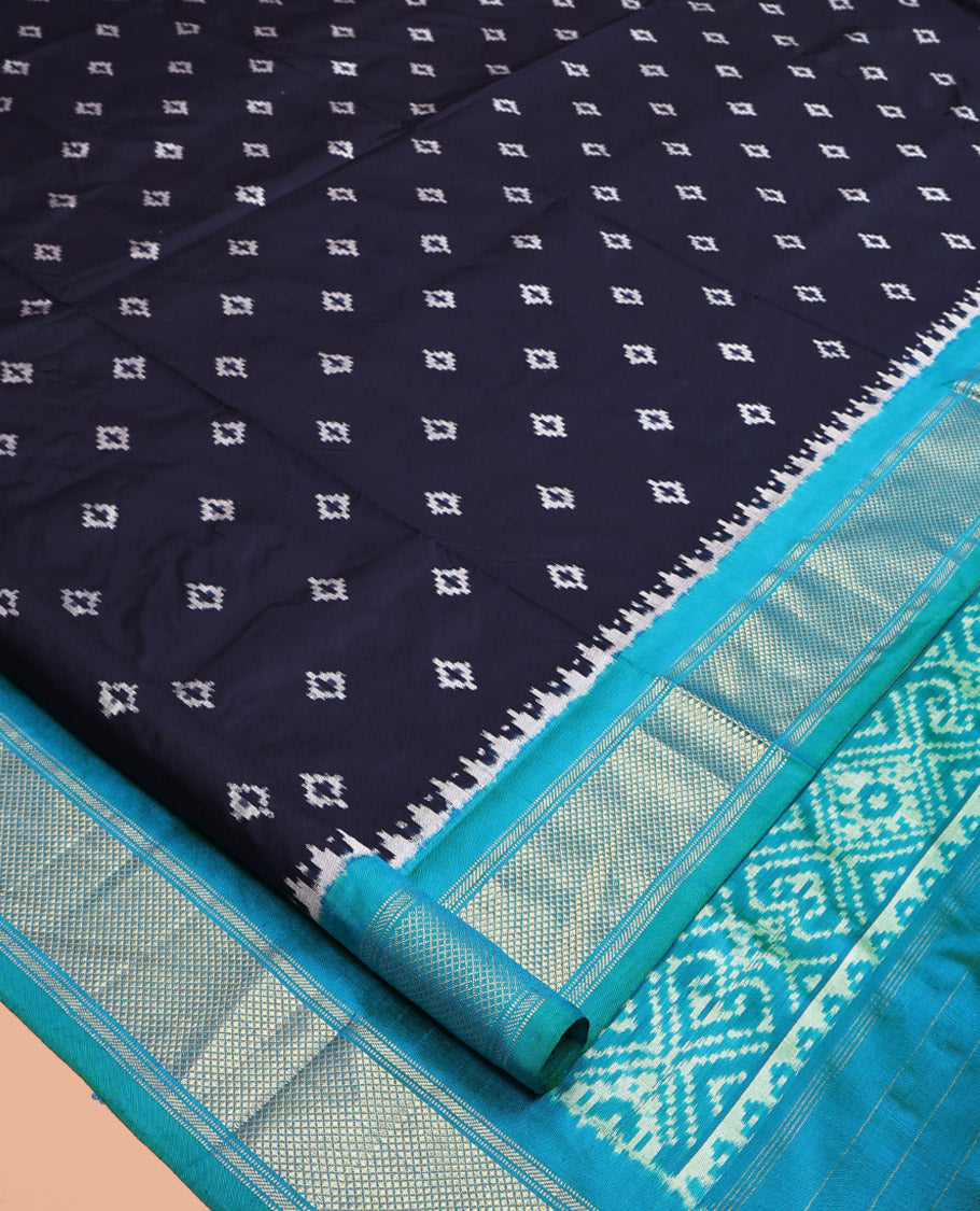 Blue Pochampally Ikat Silk Saree, Accentuated with Ikkat Buttas on Its Body, Complemented by Contrast Temple Traditional Design Border, Pallu of Intricate Patterns, and Paired with a Contrast Blouse