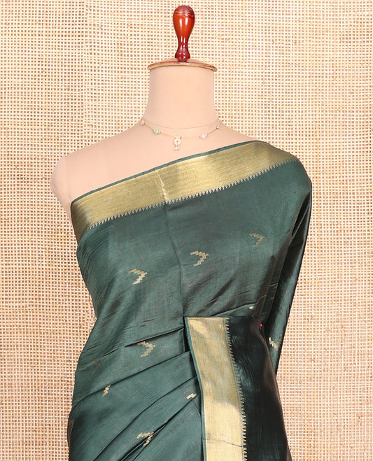 Green Banana Pith Saree Decorated with Zari Temple Buttas, Delicately Woven Temple Zari Border, Gleaming Zari Pallu of Horizontal Stripes in Zari, and Paired with a Matching Plain Blouse