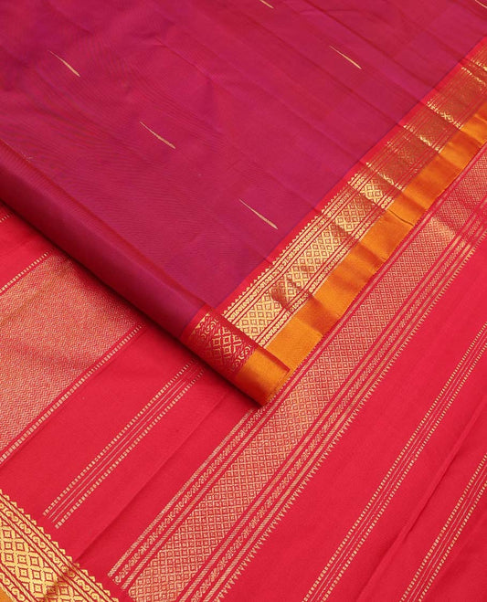 Magenta malli mokku buttas Kanchipuram silk saree, contrast border of rekku, banaras, and mayil kann designs, and traditional design pallu