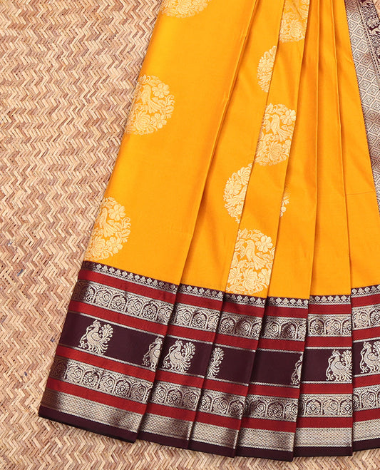 Yellow Budget Silk Saree, Dazzled with Zari Buttas All Over Its Body, Complemented by a Contrast Traditional Zari Design Border, Grand Jaal Pallu, and Paired with a Contrast Blouse
