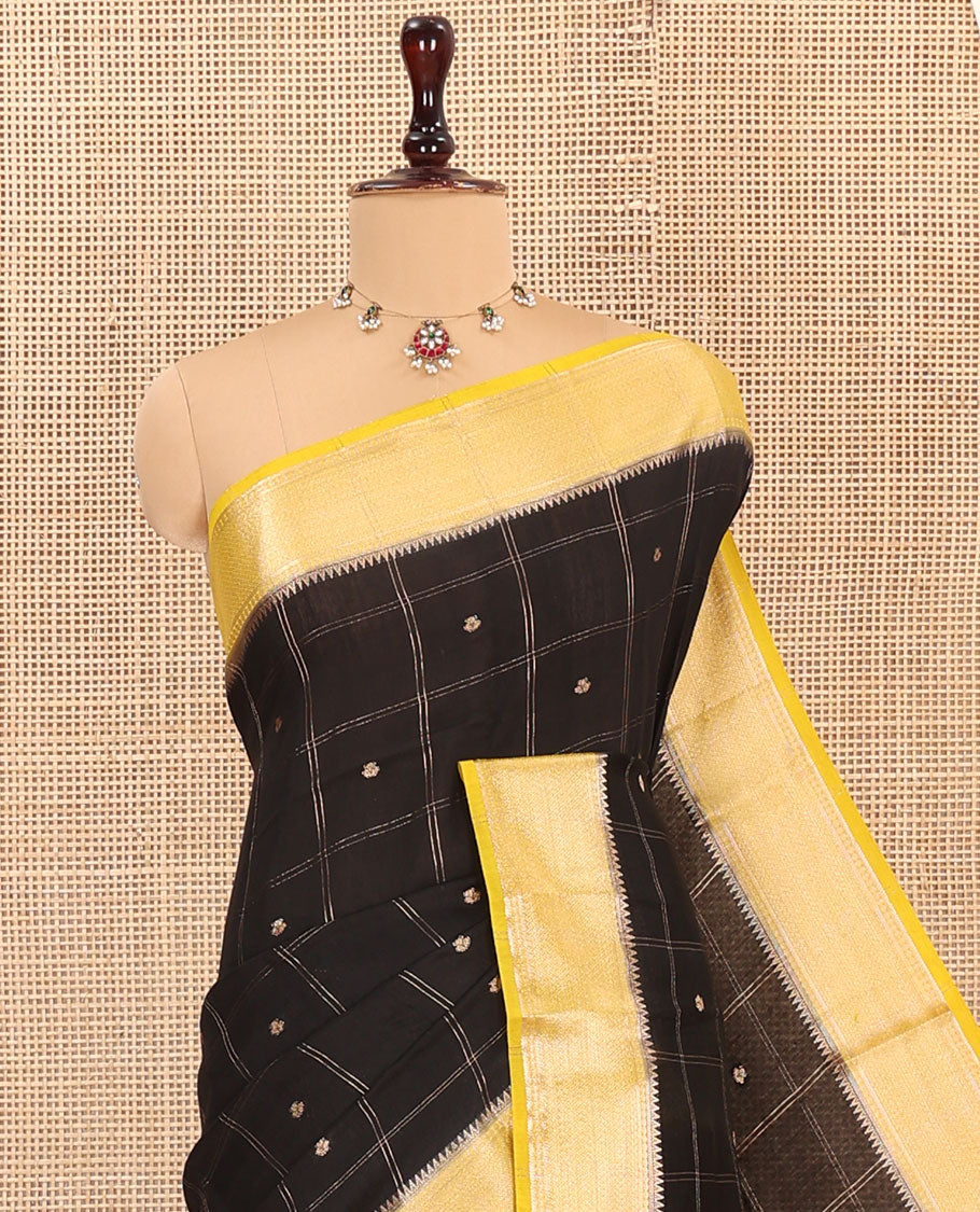 Black Assam Silk Saree, Detailed with Zari Butta Enclosed Checked Design, Complemented by Contrast Zari Border of Traditional Designs, Pallu Features Zari Designs, and Paired with a Contrast Blouse