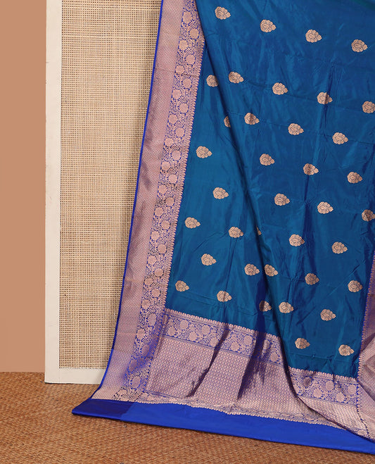 Blue thilakam motifs katan silk saree, traditional border of floral creeper design, and jaal pallu