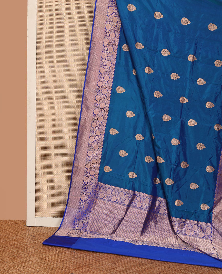Blue thilakam motifs katan silk saree, traditional border of floral creeper design, and jaal pallu
