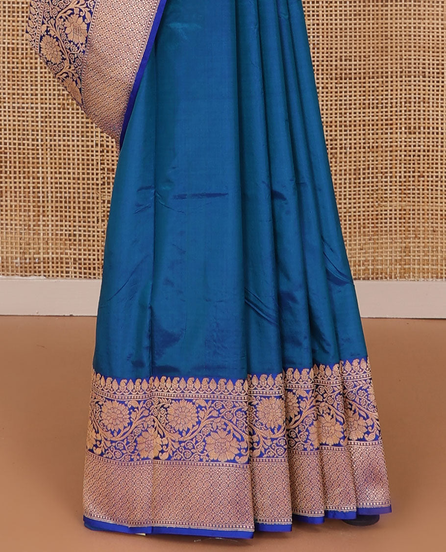 Blue thilakam motifs katan silk saree, traditional border of floral creeper design, and jaal pallu