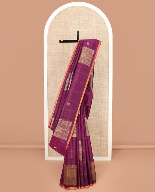 Purple Kanchipuram Silk Saree Embellished with Big Square Buttas within Checks, Complemented by a Contrast Piping Border, Featuring a Pallu Depicting Jaal Designs, Paired with a Matching Checked Blouse