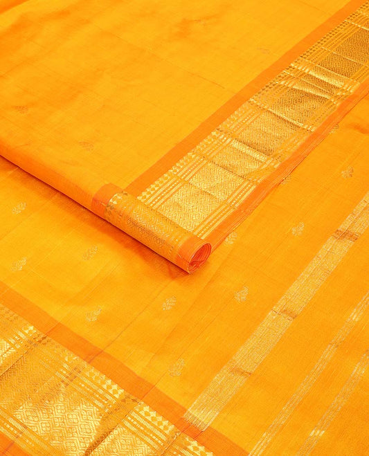 Orange buttas kancheepuram silk saree with contrast border of rekku, muthu, banaras, geometric design & floral buttas  pallu
