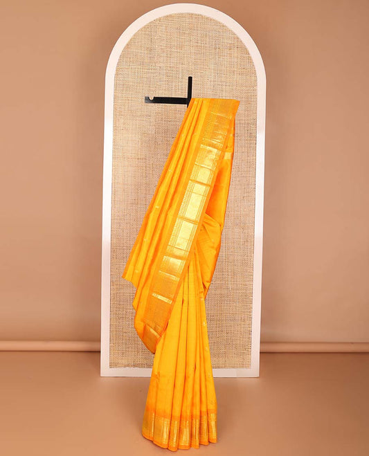 Orange buttas kancheepuram silk saree with contrast border of rekku, muthu, banaras, geometric design & floral buttas  pallu