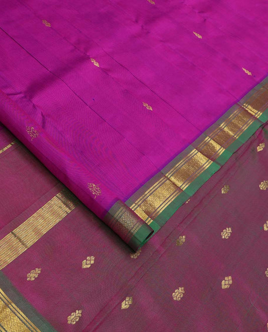 Rani Pink Kanchipuram Silk Saree, Decorated with Zari Buttas All Over Its Body, Complemented by Contrast One-Sided Border of Banaras and Jaal Designs, Pallu Features Zari Designs, and Comes Without a Blouse