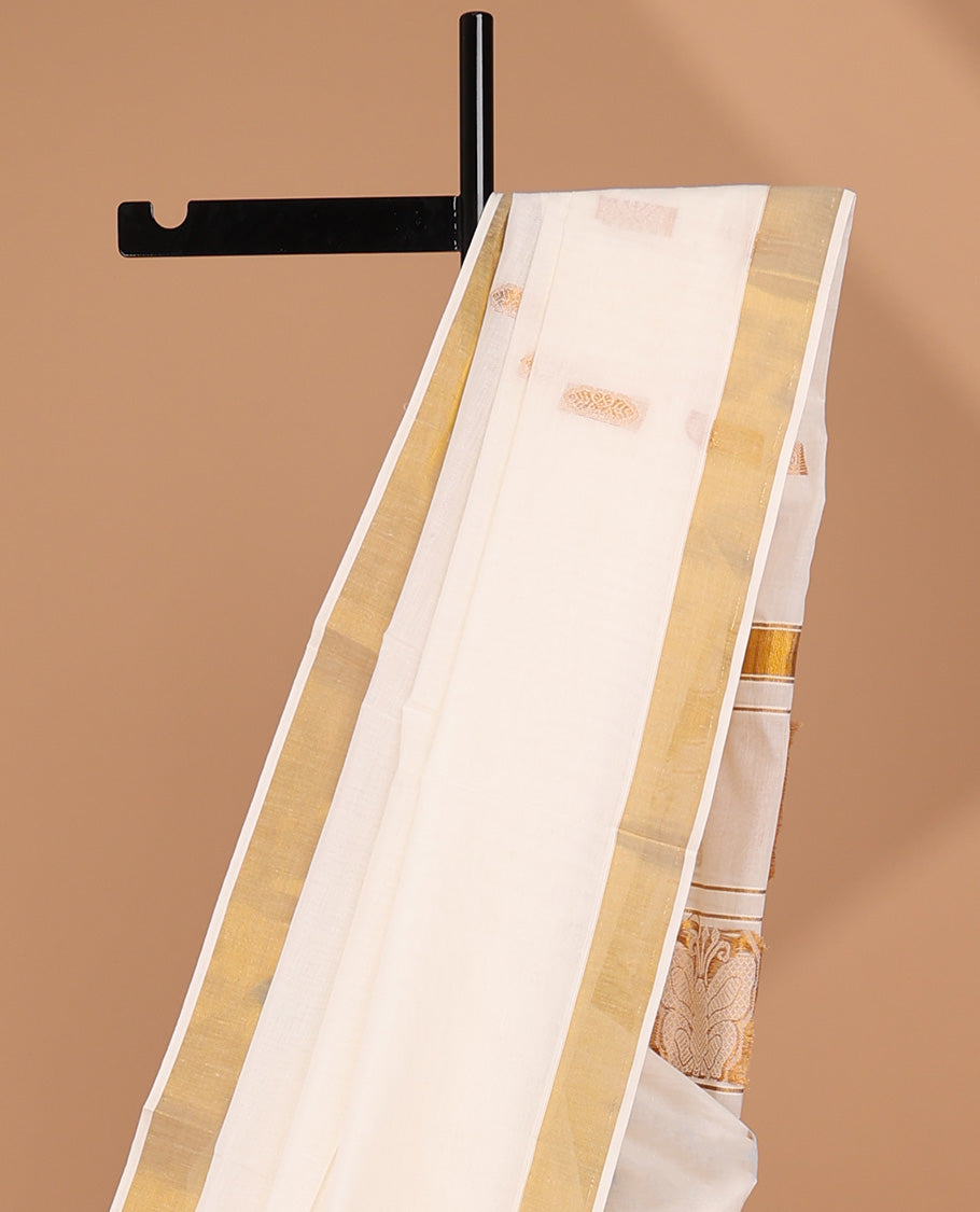 Cream kerala saree, zari border & pallu of peacock zari designs