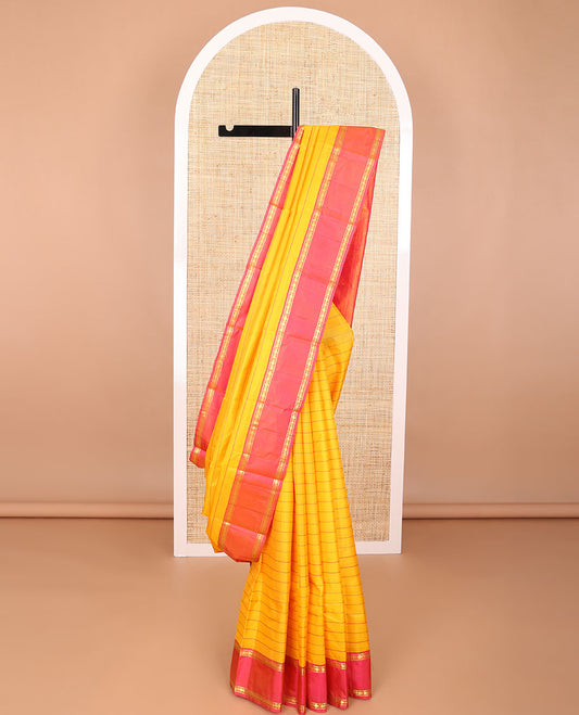 Orange striped kancheepuram silk saree with contrast rettai pettu border of banaras, paun design & zari design pallu