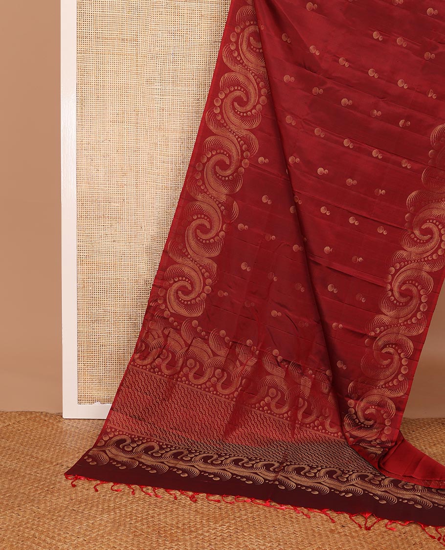 Red soft silk saree with zari buttas, spiral shaped zari woven border & zig-zag striped pallu