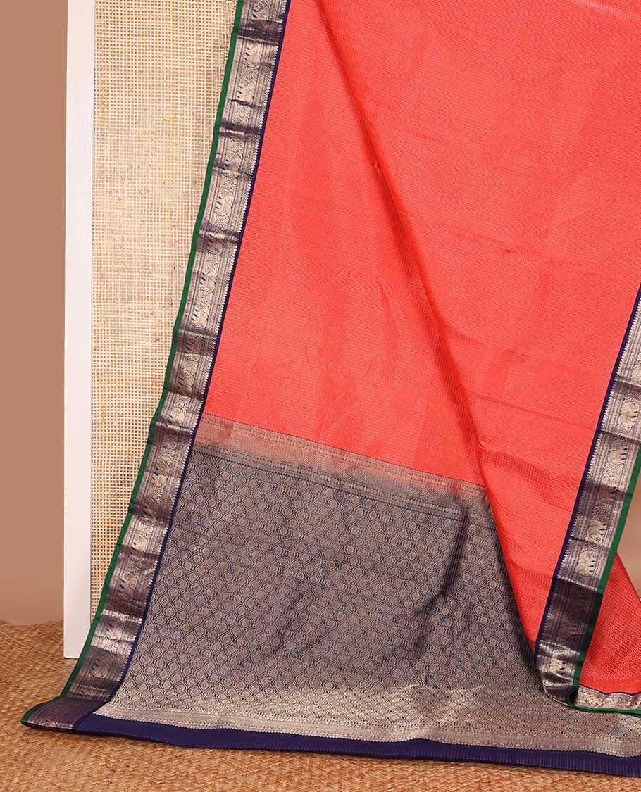 Orange zari micro checked silk saree, contrast border of thilakam mokku, Muthu, kathir and yaanai, and ogee patterned pallu
