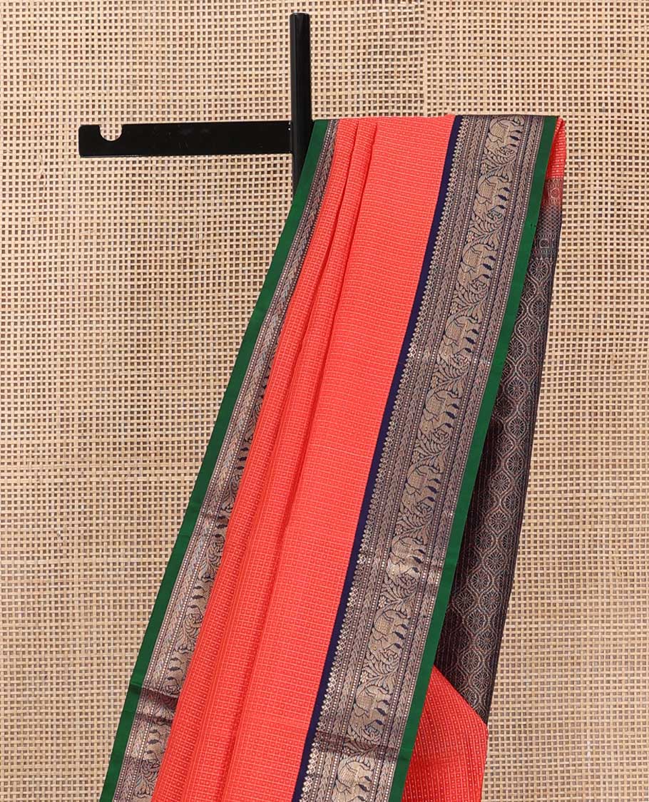 Orange zari micro checked silk saree, contrast border of thilakam mokku, Muthu, kathir and yaanai, and ogee patterned pallu