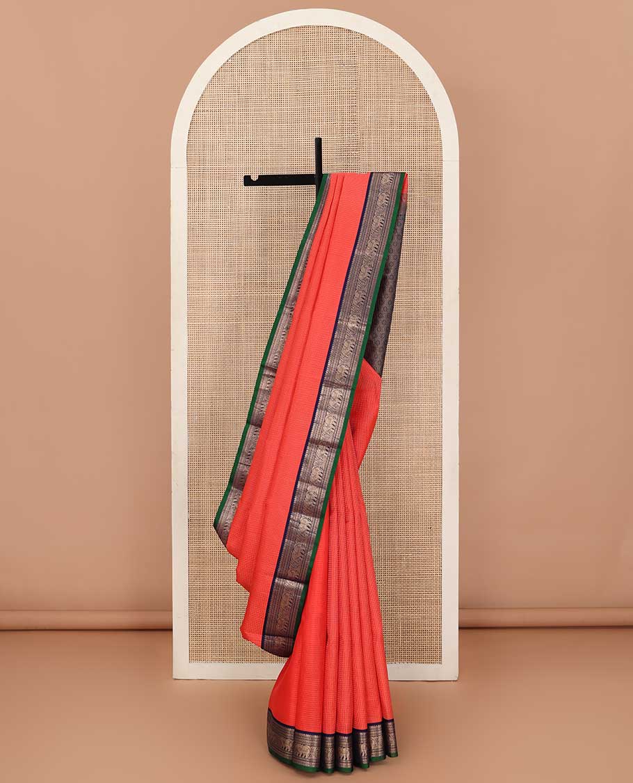 Orange zari micro checked silk saree, contrast border of thilakam mokku, Muthu, kathir and yaanai, and ogee patterned pallu