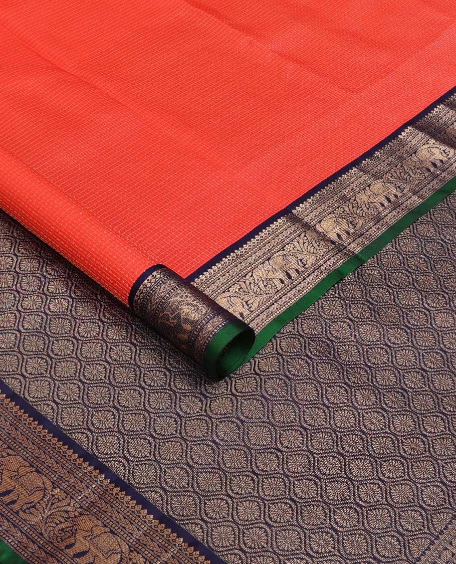 Orange zari micro checked silk saree, contrast border of thilakam mokku, Muthu, kathir and yaanai, and ogee patterned pallu