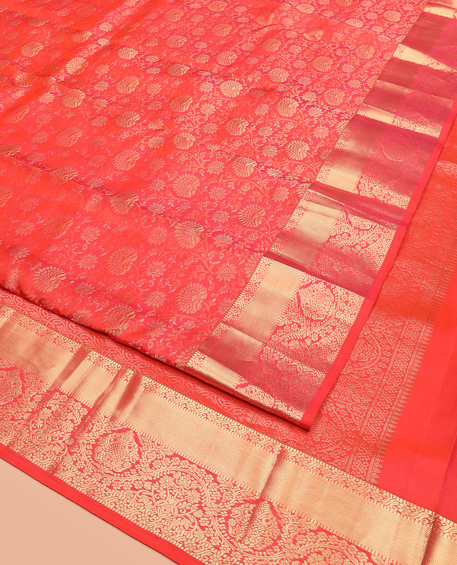 Red Kanchipuram Wedding Silk Saree Enthralled with Floral Jaal Jacquard Designs, Highlighted with Zari Border of Traditional Designs, Pallu Enriched with Geometric Designs, and Paired with a Matching Blouse