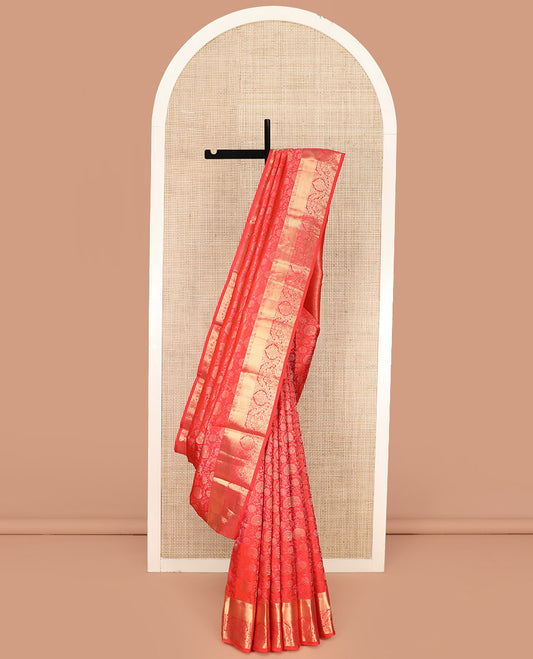 Red Kanchipuram Wedding Silk Saree Enthralled with Floral Jaal Jacquard Designs, Highlighted with Zari Border of Traditional Designs, Pallu Enriched with Geometric Designs, and Paired with a Matching Blouse