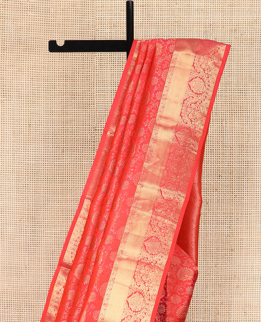 Red Kanchipuram Wedding Silk Saree Enthralled with Floral Jaal Jacquard Designs, Highlighted with Zari Border of Traditional Designs, Pallu Enriched with Geometric Designs, and Paired with a Matching Blouse