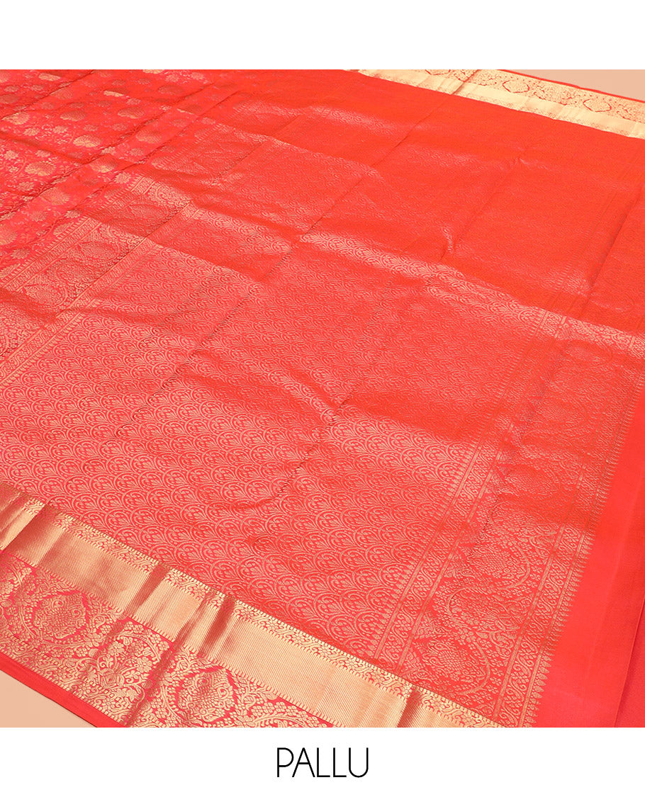 Red Kanchipuram Wedding Silk Saree Enthralled with Floral Jaal Jacquard Designs, Highlighted with Zari Border of Traditional Designs, Pallu Enriched with Geometric Designs, and Paired with a Matching Blouse