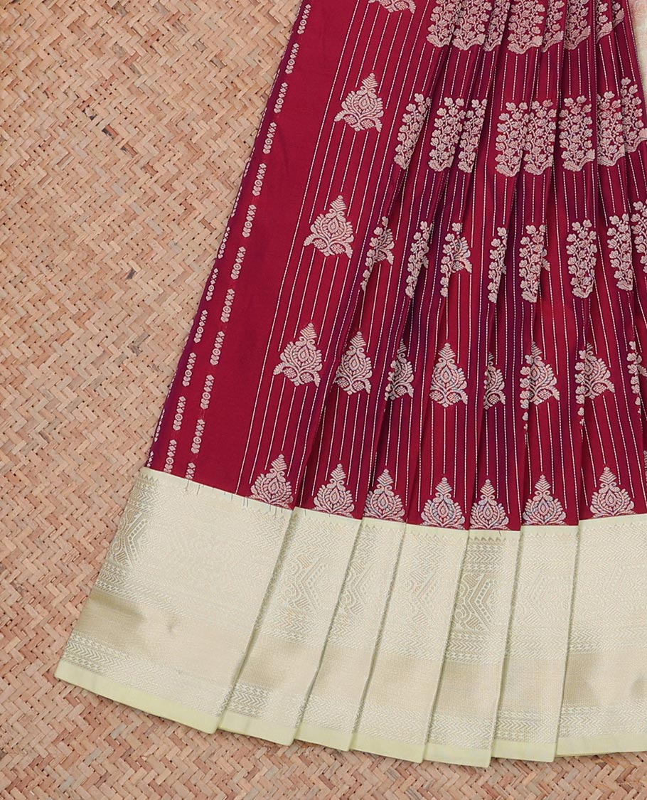 Maroon Budget Silk Saree Adorned with Zari Buttas All Over Its Body, Complemented with a Contrast Traditional Zari Design Border, Floral Zari Decked Up Pallu, and a Contrast Zari-Bordered Blouse