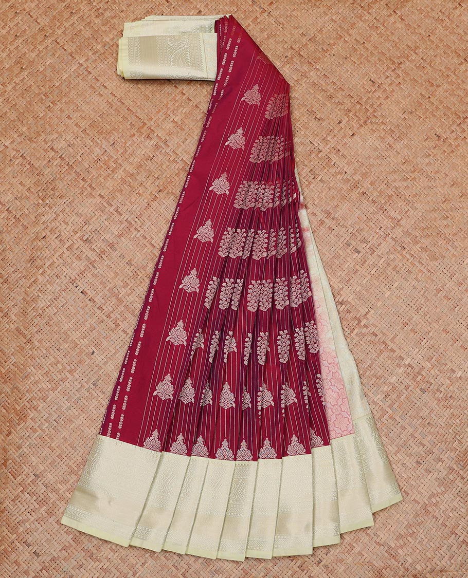 Maroon Budget Silk Saree Adorned with Zari Buttas All Over Its Body, Complemented with a Contrast Traditional Zari Design Border, Floral Zari Decked Up Pallu, and a Contrast Zari-Bordered Blouse