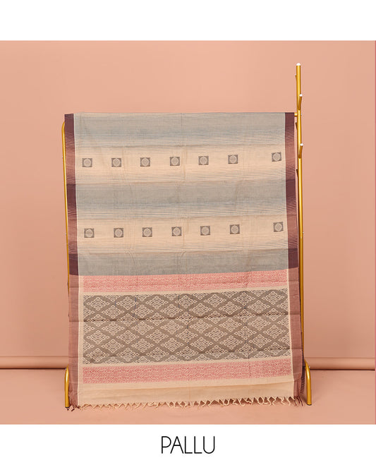Sandal Kanchi Cotton Saree, Subtly Elevated with Buttas and Stripes All Over Its Body, Complemented by Contrast Border, Pallu of Jaal Designs, and Paired with a Matching Blouse