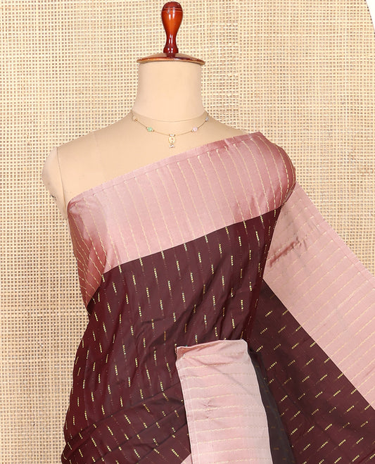 Brown Aarani Silk Saree, Featuring Zari Buttas All Over Its Body, Complemented by a Contrast Zari Striped Border, Pallu of Buttas, and Paired with a Matching Blouse