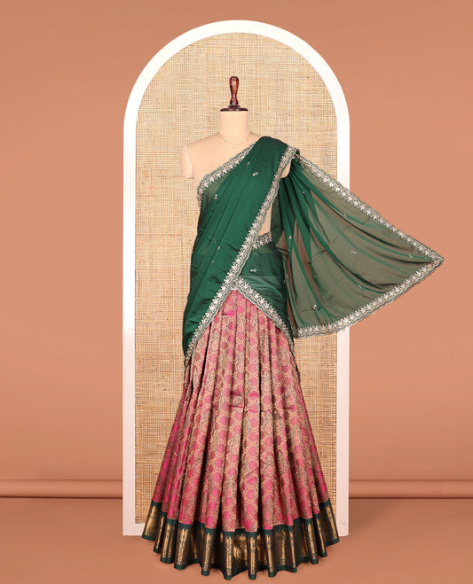 Red Art Silk Material Half Saree Set, Bedecked with Jacquard Design on Its Skirt, Complemented by Contrast Traditional Zari Design Border, Paired with a Contrast Blouse, and Scallop Embroidered Dhavani