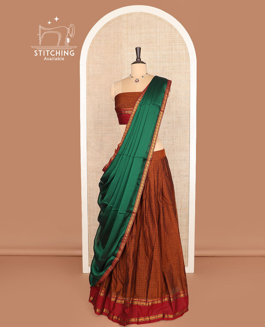 Rust cotton half-saree, checked with contrast traditional zari border skirt, matching blouse and a contrast zari piping bordered dhavani
