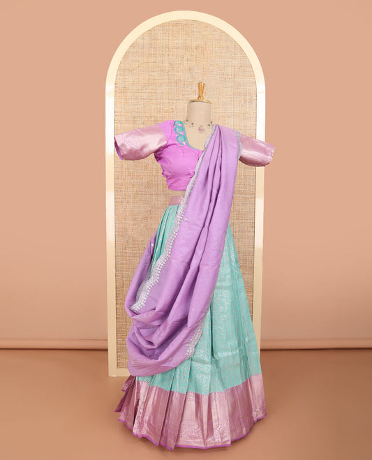 Sea blue floral jacquard half saree with contrast zari design border, floral embroidered blouse & floral embroidery dhavani