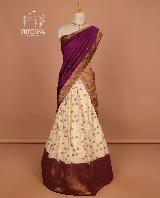 Cream floral buttas half saree with contrast zari border, zari design blouse & maroon floral zari design dhavani
