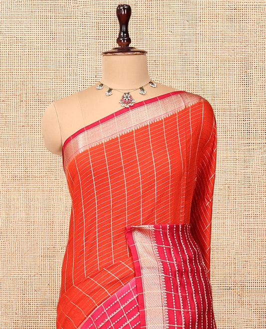 Orange Assam Silk Saree, Masterfully Woven with Zari Checks, Highlighted by a Traditional Zari Border, Striped Pallu, and a Matching Blouse