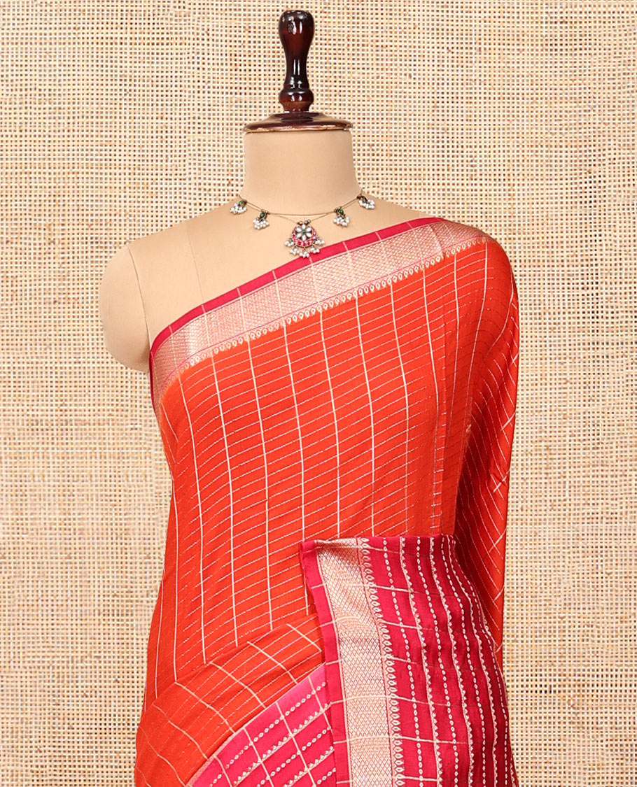 Orange Assam Silk Saree, Masterfully Woven with Zari Checks, Highlighted by a Traditional Zari Border, Striped Pallu, and a Matching Blouse