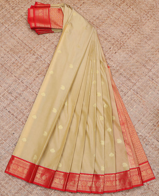 Sandal Budget Silk Saree, Woven with Buttas All Over Its Body, Complemented by a Contrast Traditional Zari Design Border of Peacock and Chakram, Pallu of Jaal Designs, and Paired with a Contrast Blouse