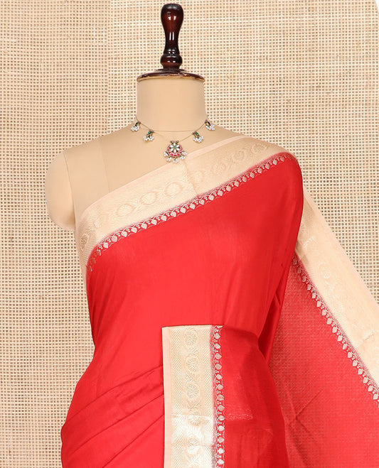 Red Plain Assam Silk Saree, Complemented by a Contrast Traditional Zari Border of Floral Creeper Designs, Gleaming Pallu of Zari Stripes, and Paired with a Contrast Blouse