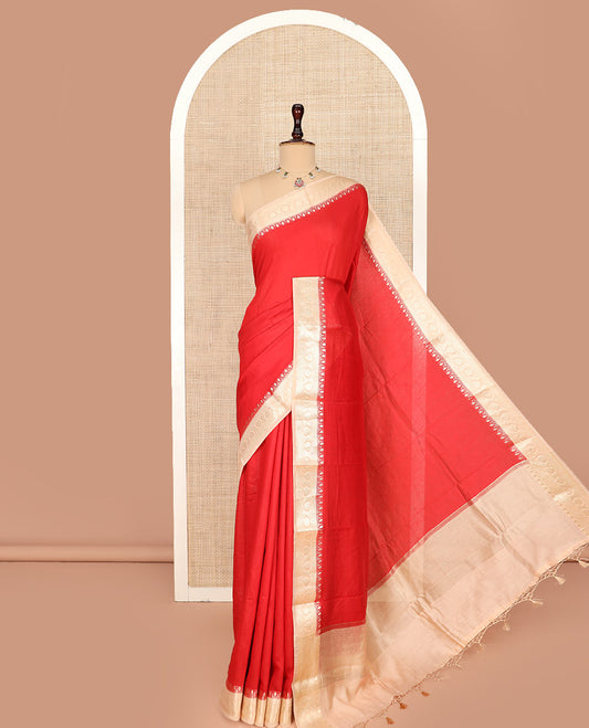 Red Plain Assam Silk Saree, Complemented by a Contrast Traditional Zari Border of Floral Creeper Designs, Gleaming Pallu of Zari Stripes, and Paired with a Contrast Blouse