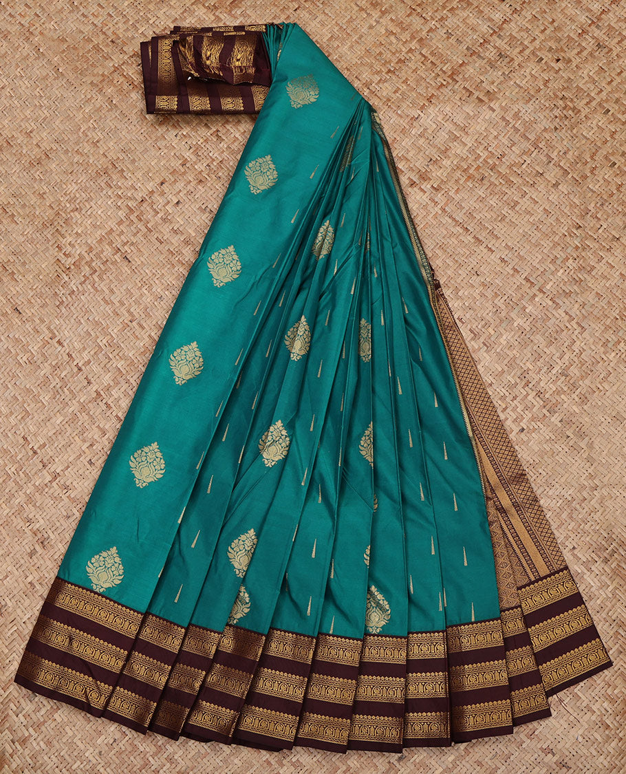 Green Budget Silk Saree, Gleamed Up with Zari Buttas All Over Its Body, Complemented by a Contrast Traditional Zari Design Varisai Pettu Border, Grand Jaal Pallu, and Paired with a Contrast Blouse