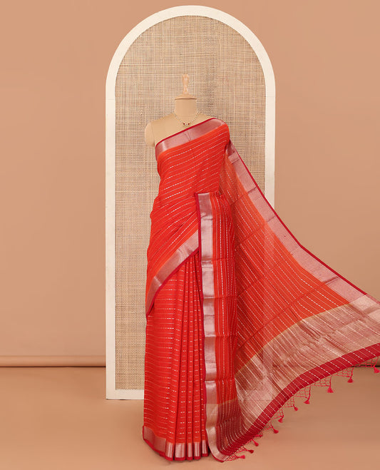 Red horizontal striped Assam silk saree, traditional zari border, and zari-rich gleaming pallu